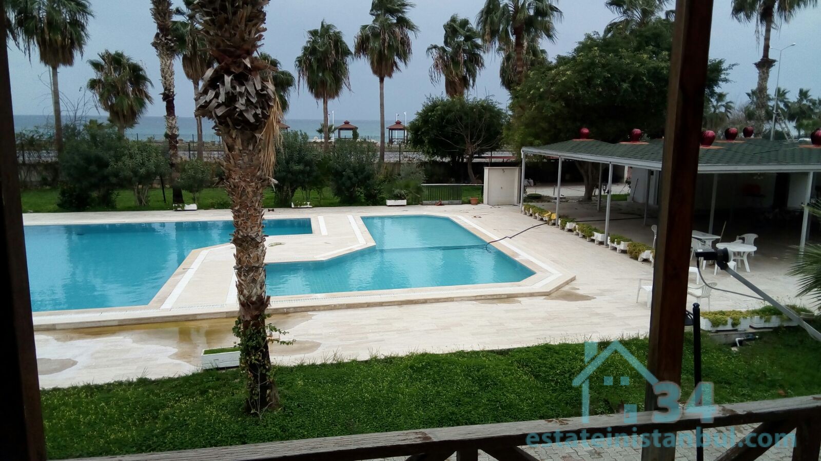 Three Bedroom Furnished Seaside Duplex Villa with a Sea and Pool View in Mahmutlar Alanya